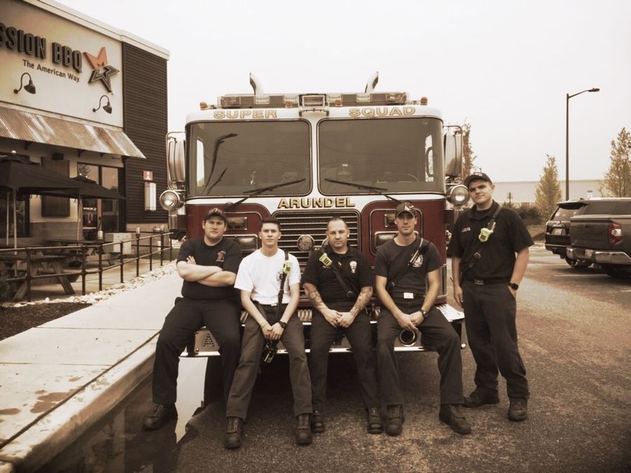 AVFD members together in front of the squad