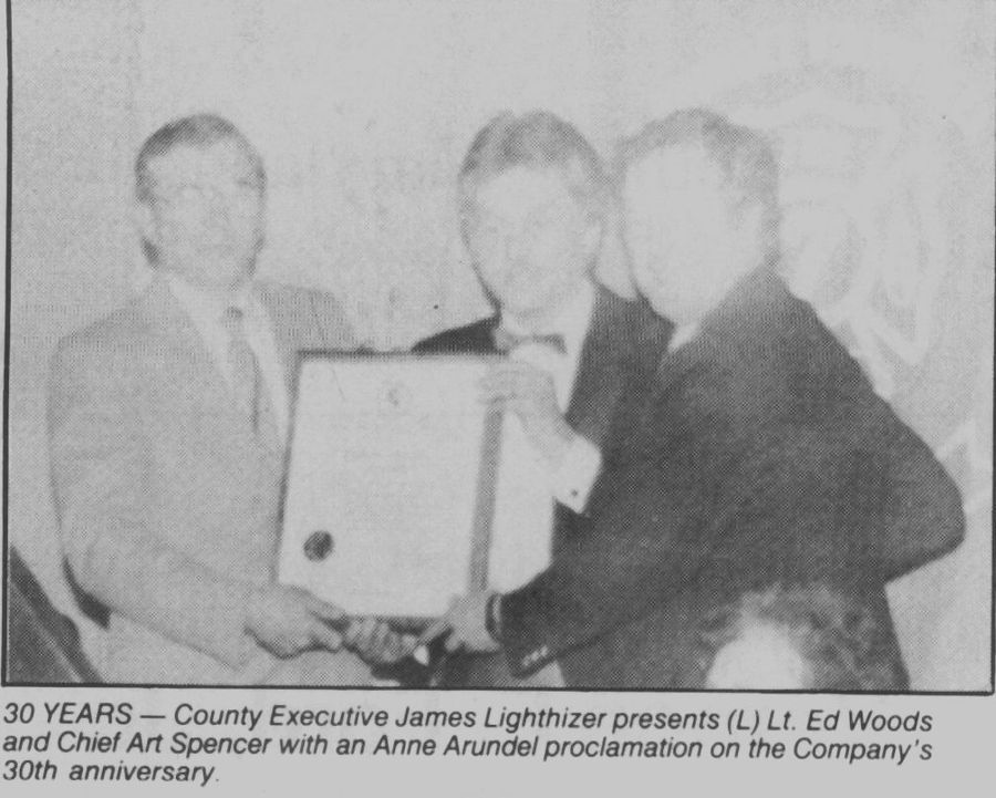 County Executive James Lighthizer presents the 30th-anniversary proclamation.