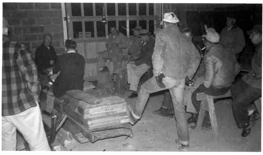 Saturday work party: members building the original station by hand.