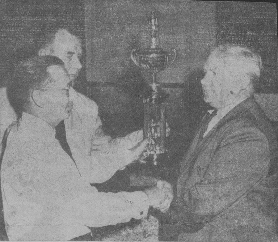 Accepting the Jess Fisher trophy — awarded for the most man-hours of University of Maryland fire training.