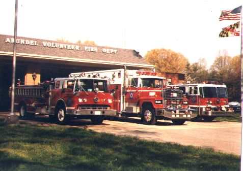 Station 7, flag flying, rigs out front.