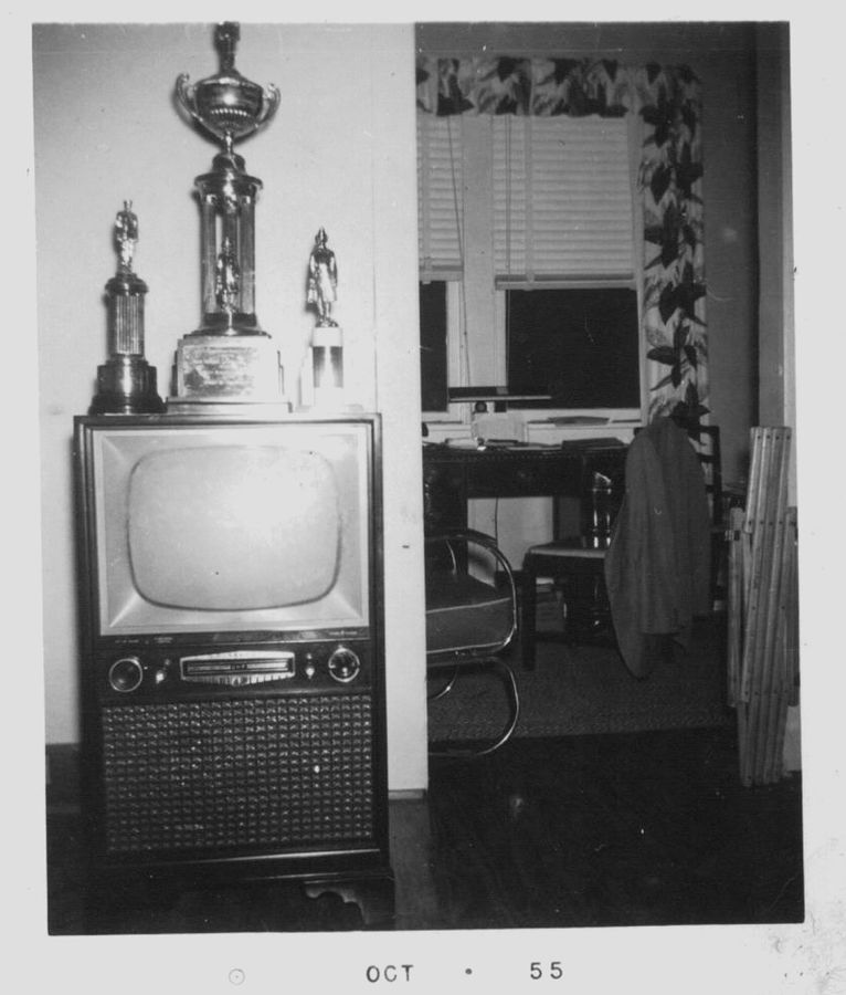 The first trophies on display — atop the television, where everyone would see them.