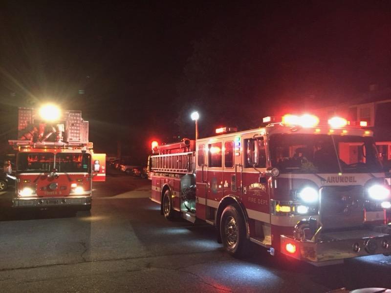 AVFD engines lined up on a night incident, emergency lights on