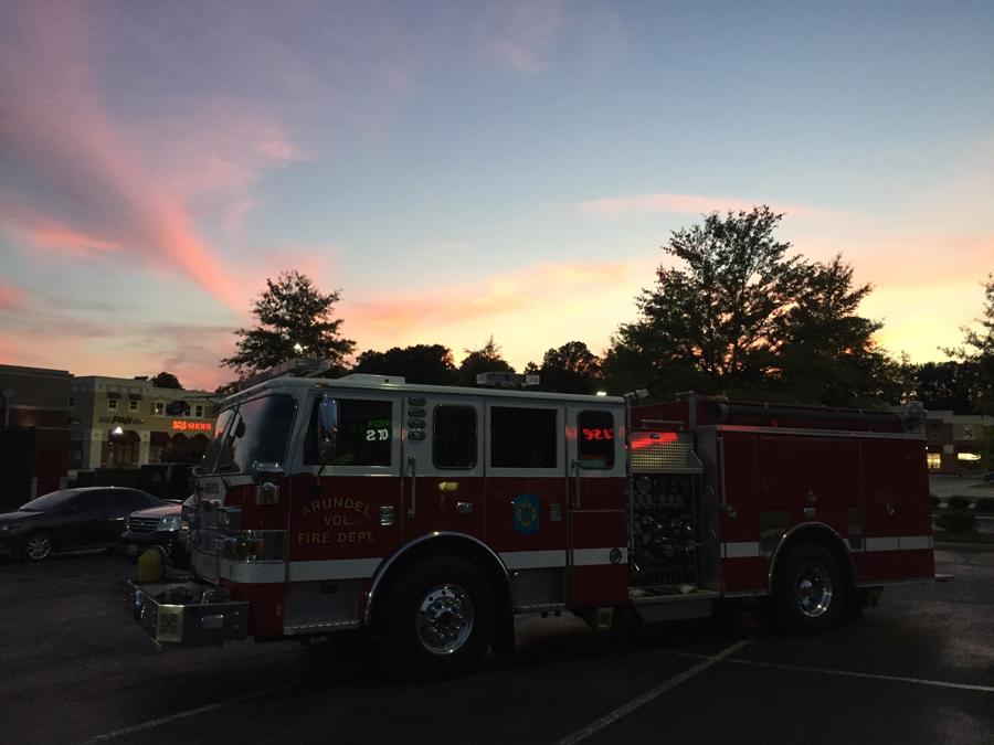 An AVFD engine parked under a sunset sky